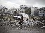 Une ambulance abandonnée à Machhad, un quartier de la partie libérée de la ville, devenu un des bastions de l'ASL.<br> <i> <b> An abandoned ambulance in Moshed, a neighborhood in a liberated part of the city which is a Free Syrian Army stronghold</b></i><br><i>© Sebastiano Tomada - Sipa Press - 2013</i>